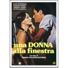 Una donna alla finestra